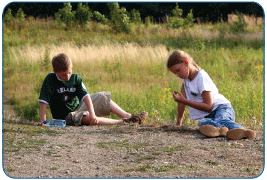Boy and Girl Playing Outside